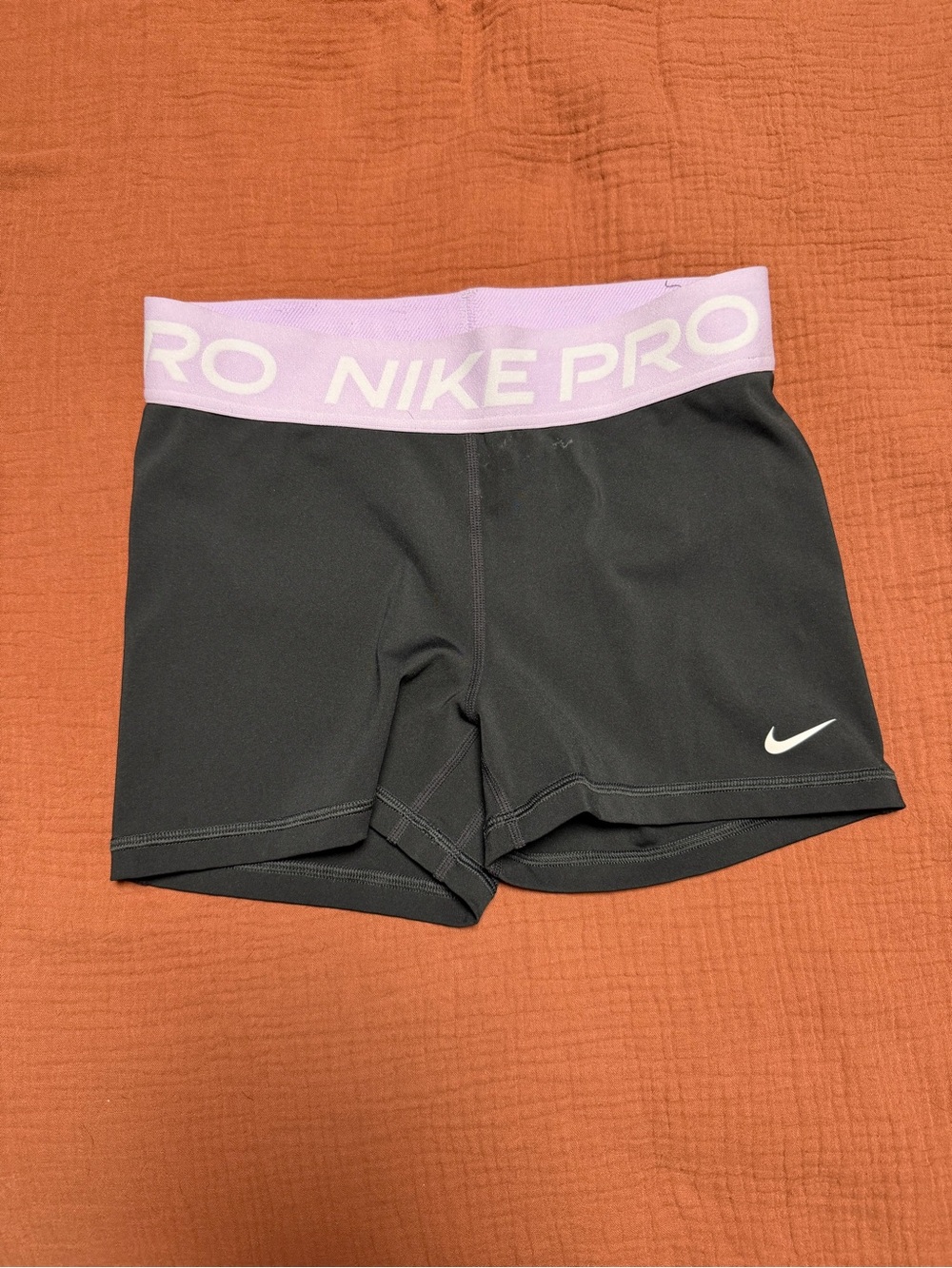 Nike Women's Black Athletic Shorts with Light Pink Branded Waistband